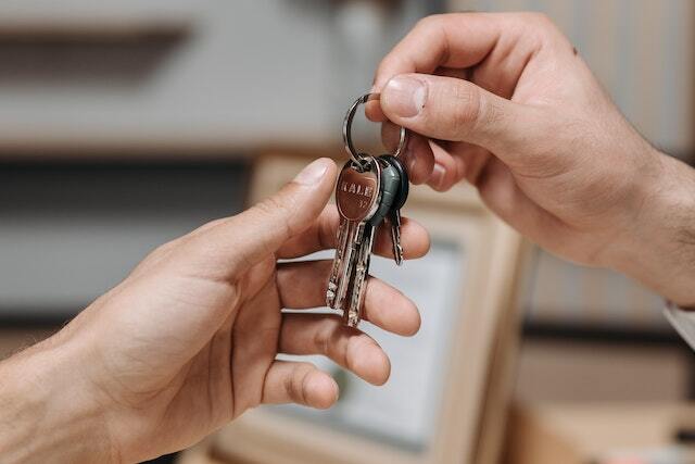 two people exchanging property keys
